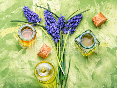 Herbal oil and lavender flowers