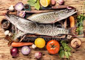 Fish pike on the kitchen board