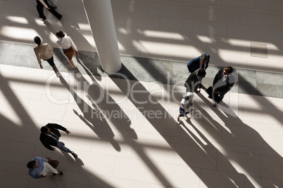 High angle view of business executives in lobby