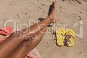 African-American woman relaxing on the beach