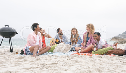 Group of friends enjoying on beach