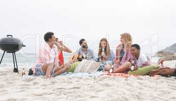 Group of friends enjoying on beach