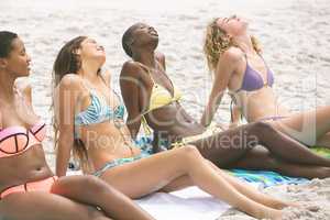 Women with bikini relaxing at beach
