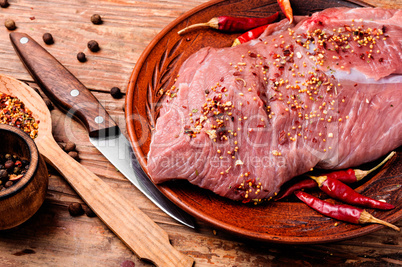 Raw meat with spices