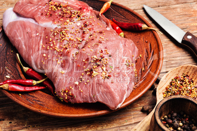 Raw meat with spices