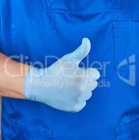 doctor in blue uniform shows a gesture of approval, like