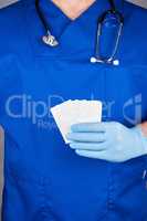 doctor  holding a blank white paper business card
