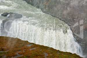 Closeup of Gullfoss waterfall in a cloudy day