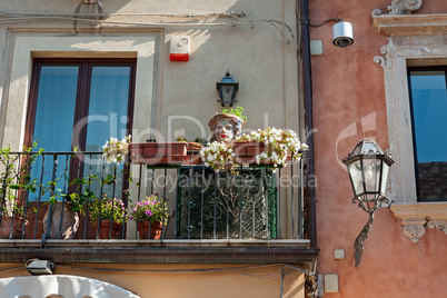 Balcony decorated with typical vases
