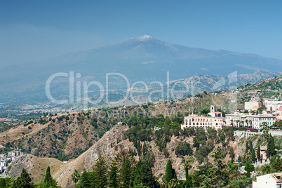View of a part of Taormina city and the Etna volcano, Sicily, It