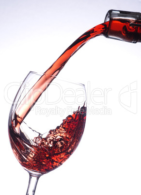 Pouring a glass of red wine