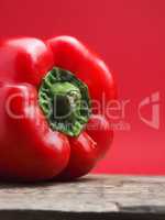 Organic bell pepper on a wooden table