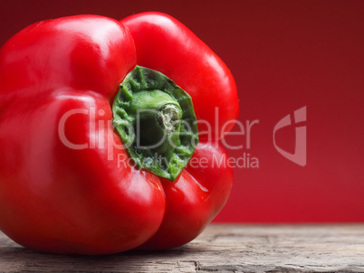 Organic bell pepper on a wooden table