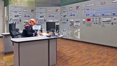 Engineer at main control panel