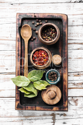 Spices and herbs on kitchen table