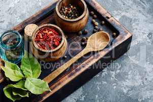 Spices and herbs on kitchen table