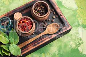 Spices and herbs on kitchen table