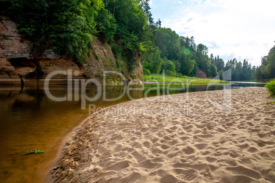 Landscape with river, cliff  and forest in Latvia.