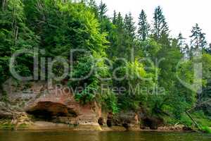 Landscape with river, cliff  and forest in Latvia.