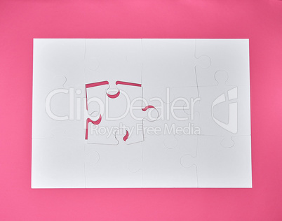 white large blank puzzles on a pink background