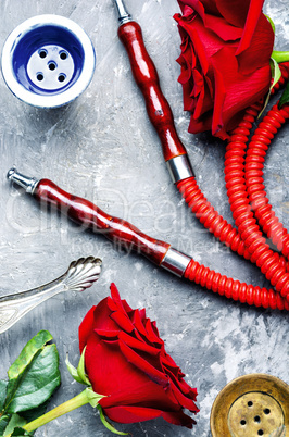 Smoking hookah with rose flavor