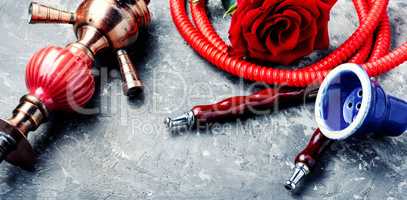 Smoking hookah with rose flavor