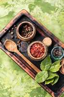 Spices and herbs on kitchen table