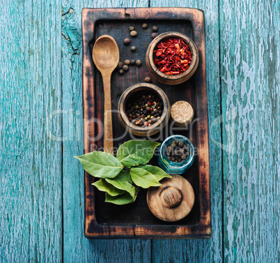 Spices and herbs on kitchen table