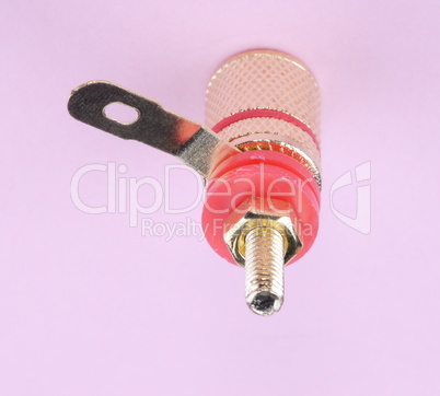 Speaker connector on pink background
