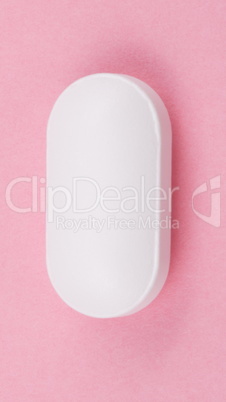 White Pill on Pink Background