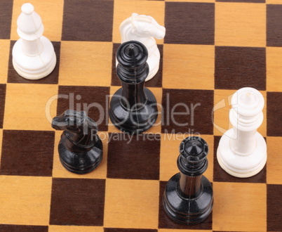 wooden checkerboard with figures