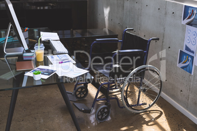 Wheelchair on a desk in the office