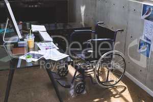 Wheelchair on a desk in the office