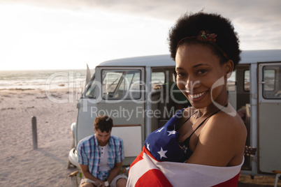 Beautiful woman standing at beach on a sunny day