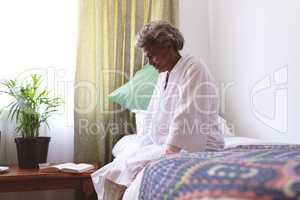 Senior woman sitting upset in nursing home