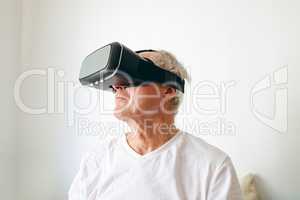 Senior male patient using virtual reality headset
