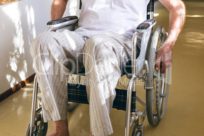 Senior male patient sitting in wheelchair