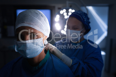 Female surgeons getting ready before operation