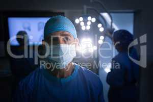 Male surgeon standing at operation theater