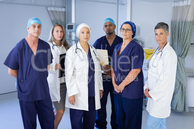 Doctors and surgeons standing in a clinic