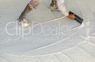 Worker Wearing Spiked Shoes Smoothing Wet Pool Plaster With Trowel