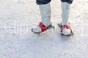 Worker Wearing Spiked Shoes Standing in Wet Plaster Pool