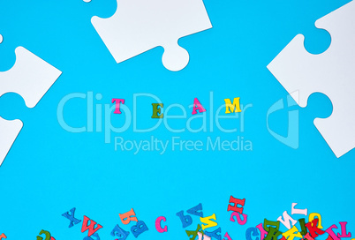 big paper blank white puzzles on a blue background