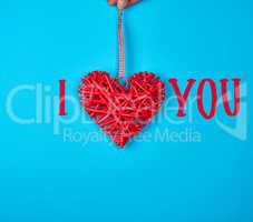 wicker red heart on a blue background