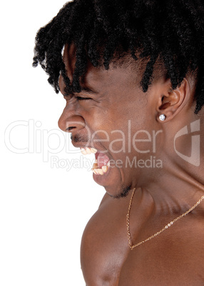 A close up image of a screaming black man in profile