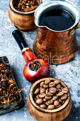 Smoking pipe and coffee