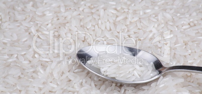 rice food background and teaspoon