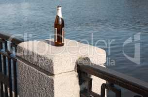 bottle on fence