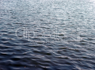 glare on water in city park pond