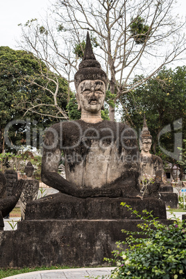 Buddha statues in the buddha park in Vientiane, Laos.